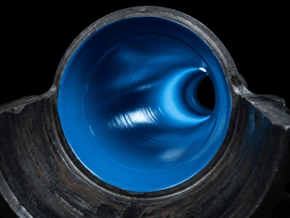 Rehabilitated pipe interior after spray lining in Orange County